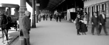 Black and white photo of Flinders st Station with Horse and Cab